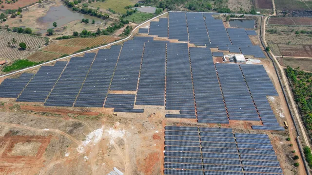 Aerial view of solar-panel arrays at the Haveri project in Karnataka